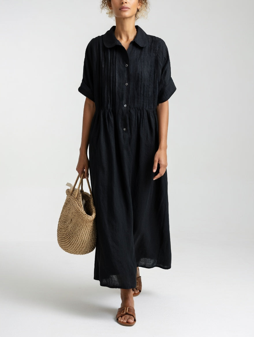 Vestido camisero largo de mujer, fluido y ligero, con un toque de elegancia casual para verano.