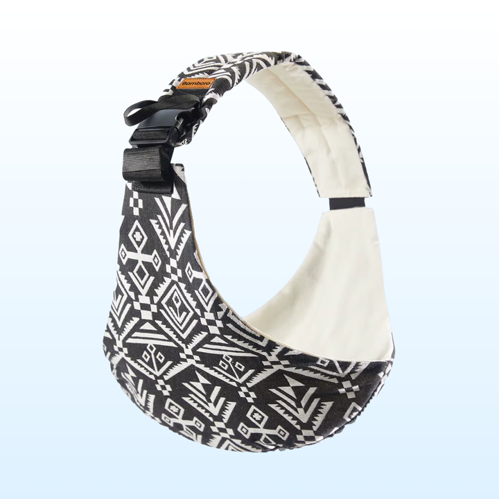 Portabebés de cadera gris, diseño moderno y ergonómico para la crianza.