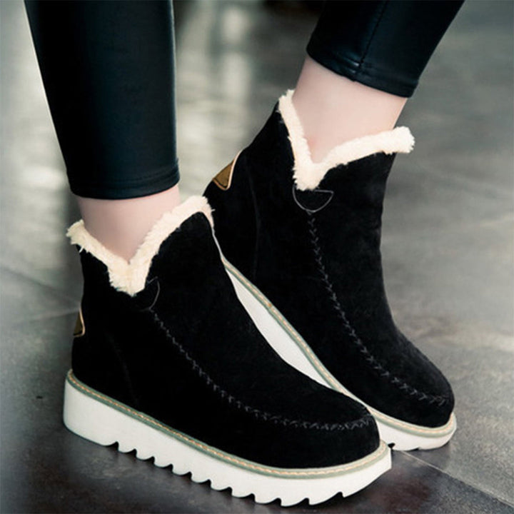 Botas de invierno cálidas y antideslizantes para mujer, color negro. Ideales para el frío y la nieve.