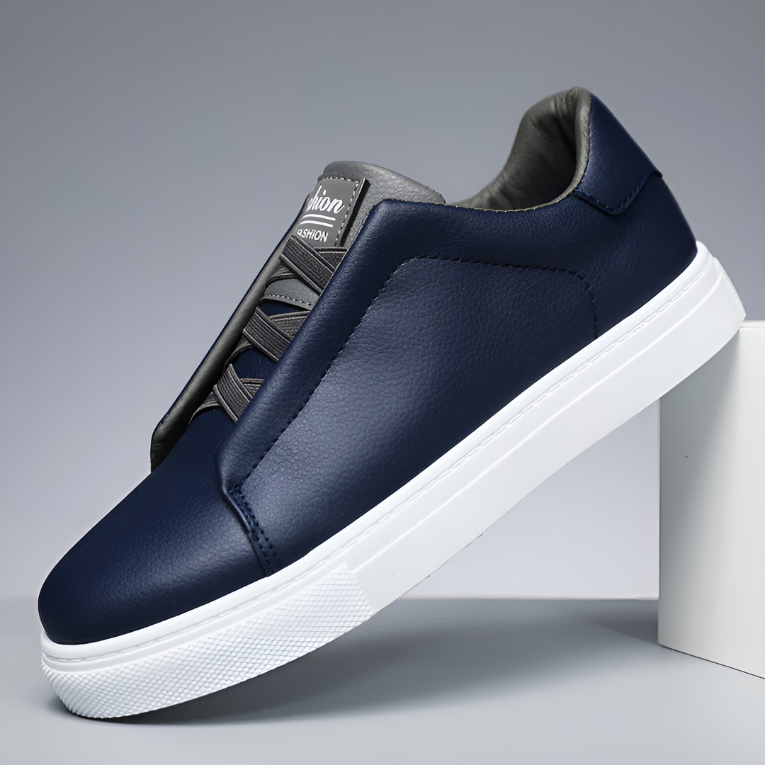 Calzado deportivo atemporal para hombre. Zapatillas elegantes en blanco, azul o negro, ideales para un look versátil.
