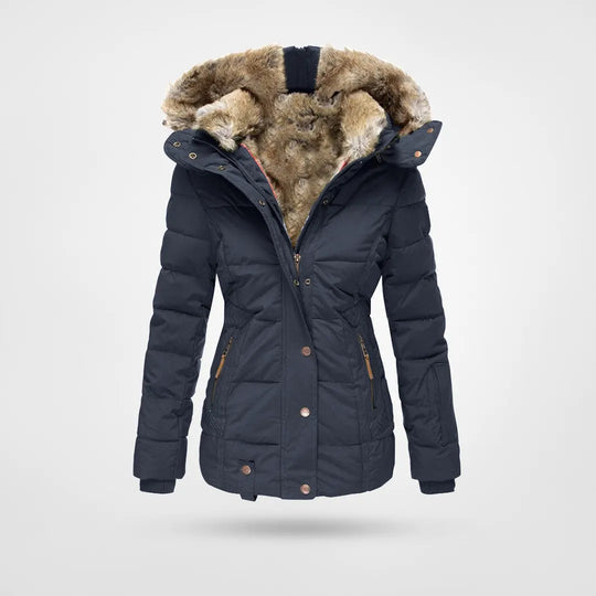 Abrigo acolchado con capucha de mujer. Esencial para combatir el frío, con estilo y confort invernal.