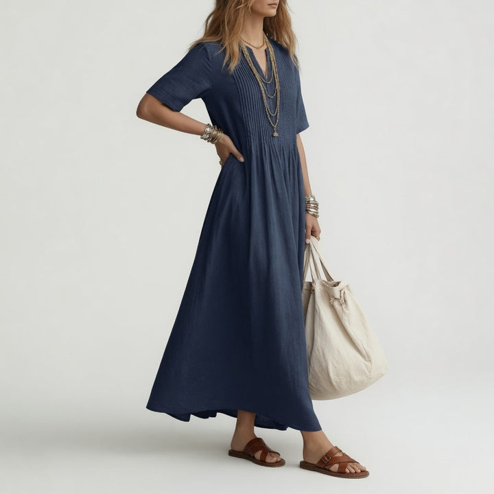 Moda femenina: vestido largo de verano, cuello V, algodón. Cómodo y elegante para casual, playa o vacaciones.