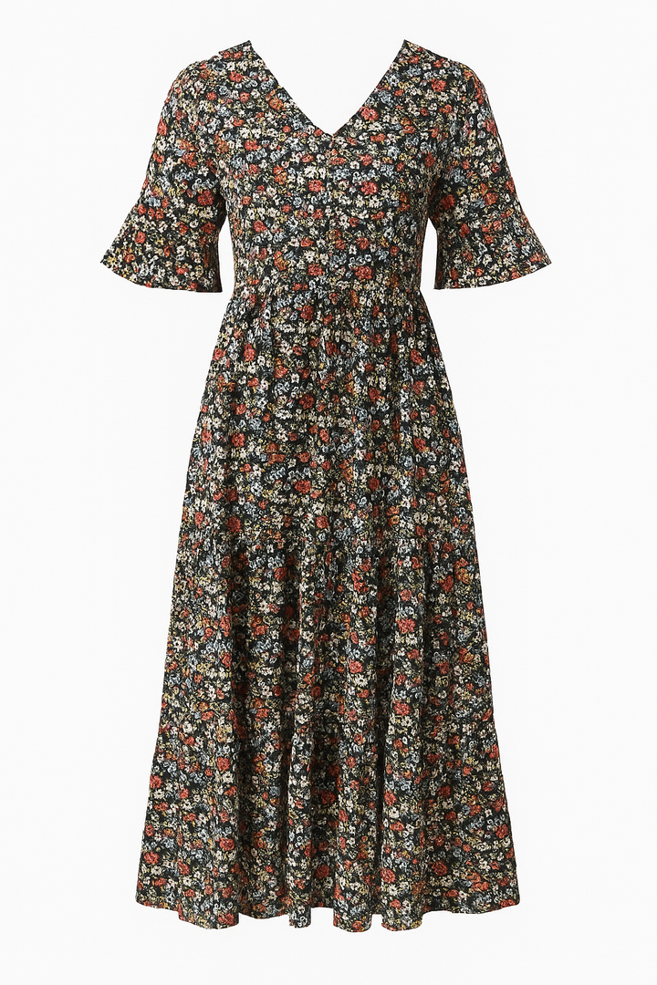 Vestido midi floral versátil de mujer. Delicado estampado, ideal para ocasiones casuales o elegantes de verano.