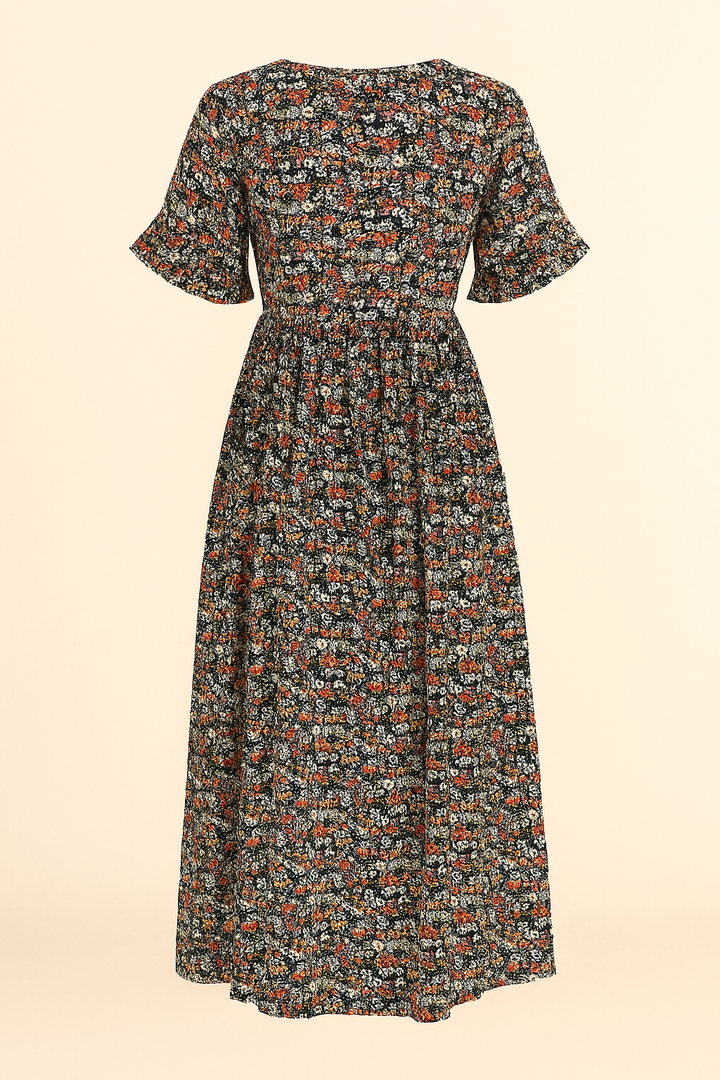 Vestido floral midi para mujer, ideal para verano. Diseño vibrante y casual, perfecto para invitadas boho.