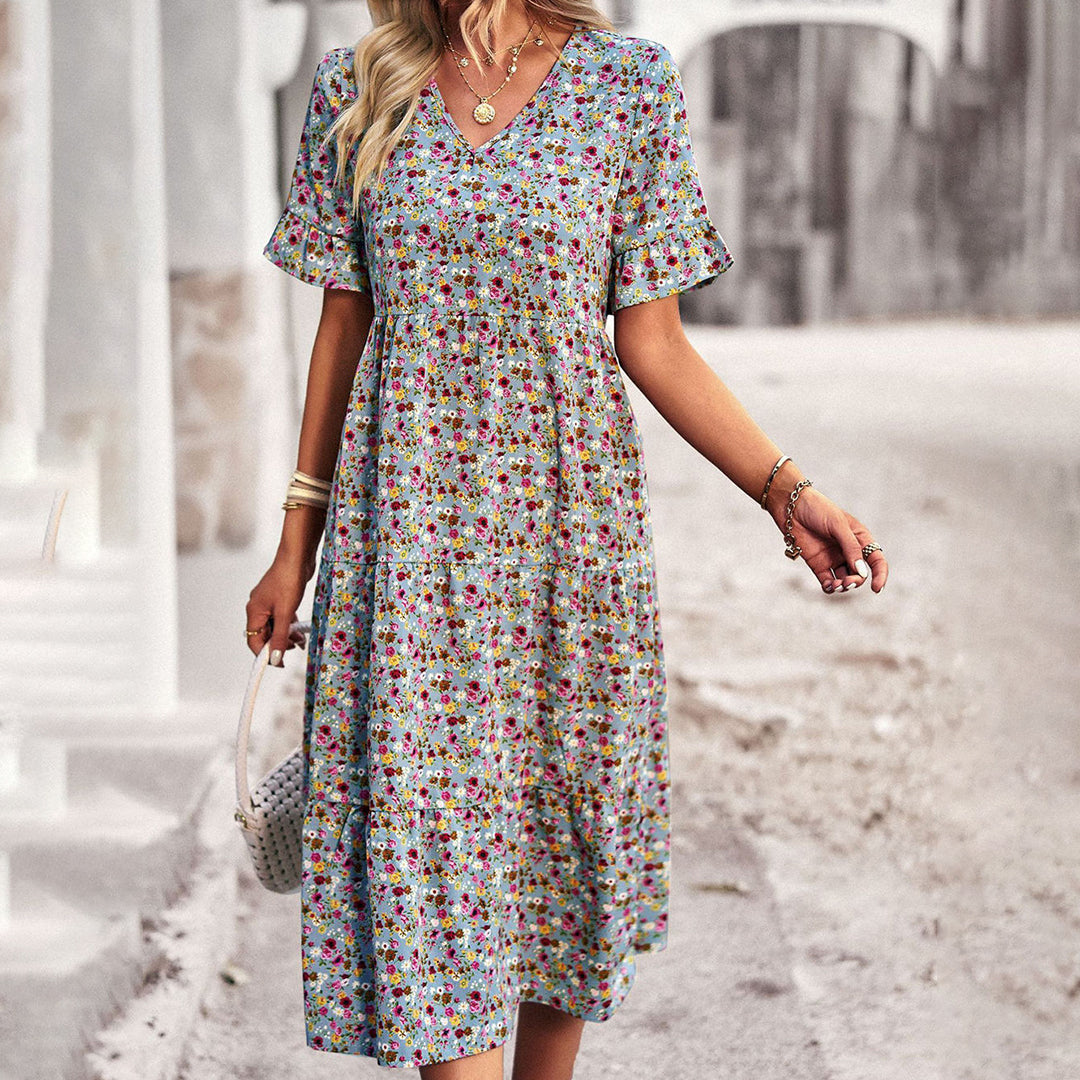 Elegante vestido midi floral para mujer. Perfecto para fiestas, bodas y eventos especiales de verano.