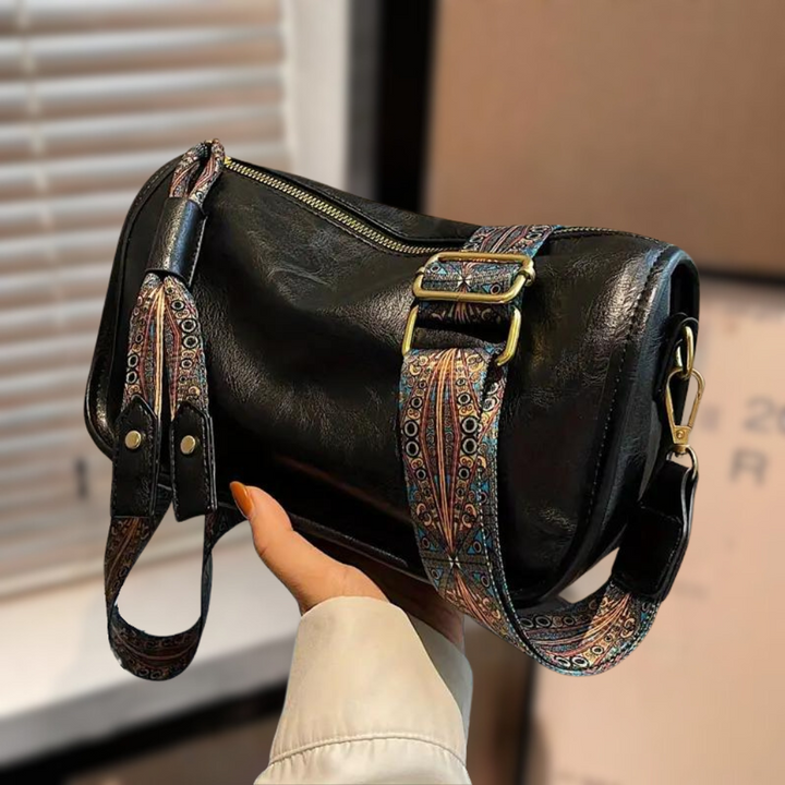 Bolso bandolera ARVÉA elegante para mujer en color negro, accesorio moderno y versátil para moda femenina.