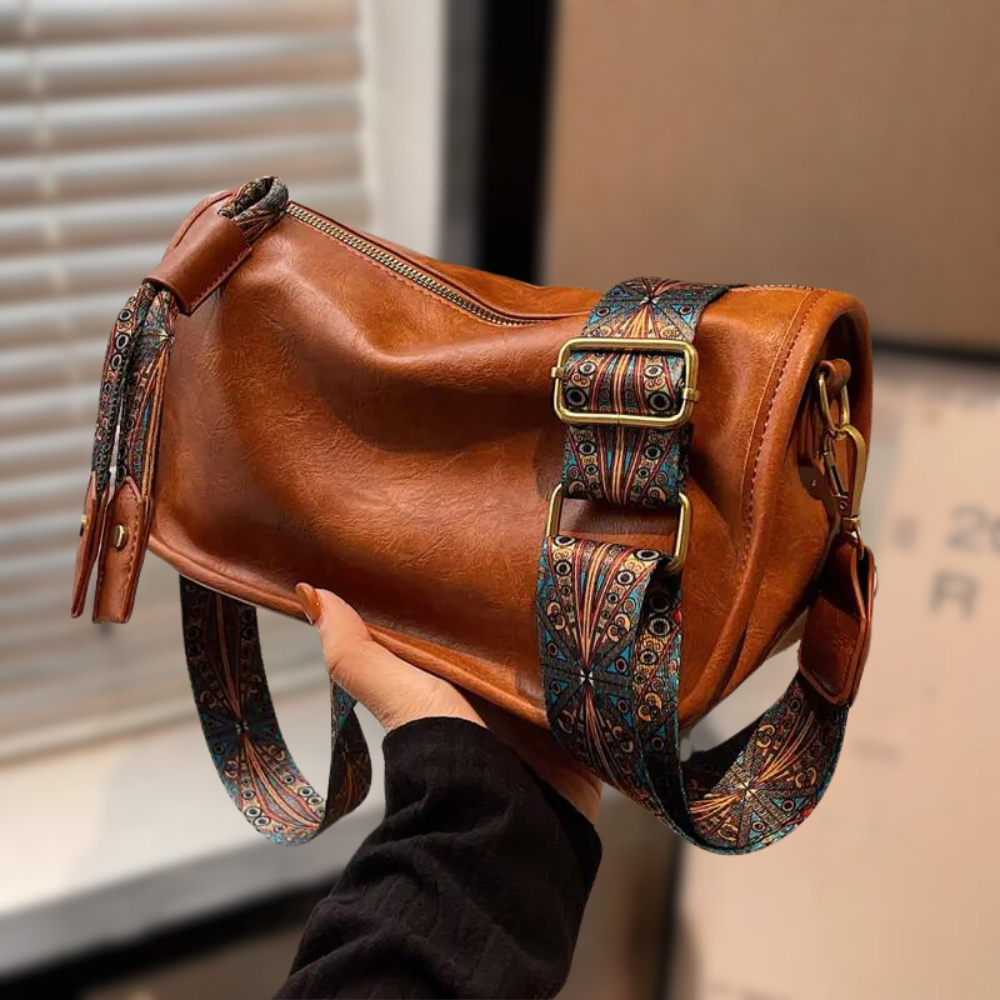 Bolso bandolera ARVÉA espacioso para mujer, ideal para organizar con estilo. Disponible en marrón o beige.