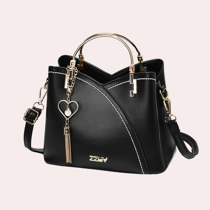 Bolso de mujer con correa ajustable, tamaño pequeño y versátil. Bandolera cómoda para el día a día.