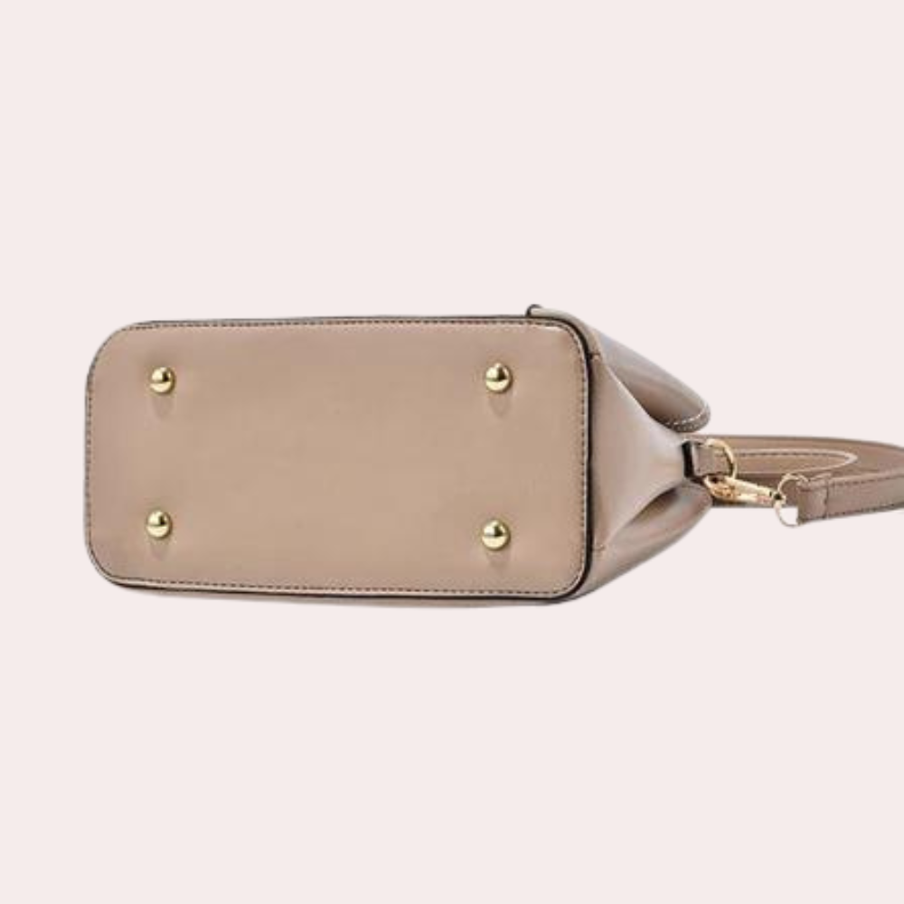 Bolso compacto para mujer, tipo bandolera con correa ajustable. Perfecto para lo esencial con estilo elegante.