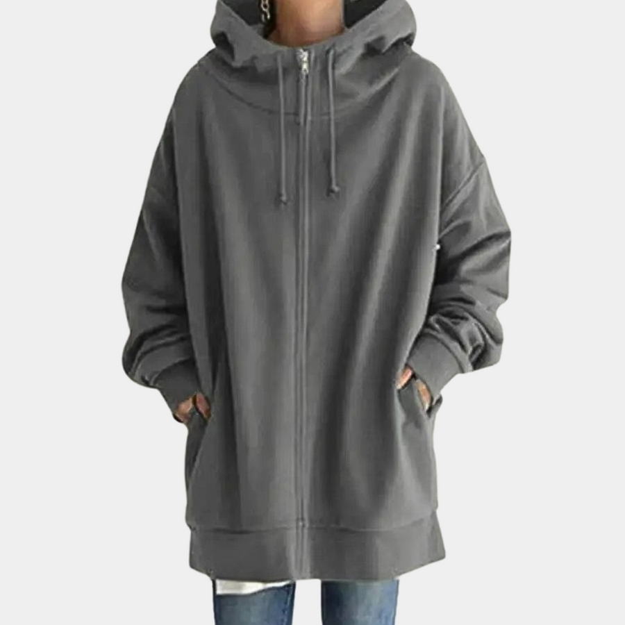 Sudadera con capucha y cremallera para mujer, color gris claro. Estilo casual y cómodo, ideal para otoño-invierno.