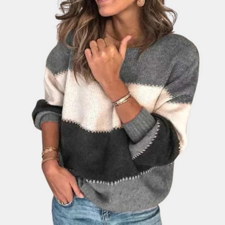 Suéter moderno para mujer, bloques de color vibrantes. Un jersey holgado y cómodo, ideal para el día a día.