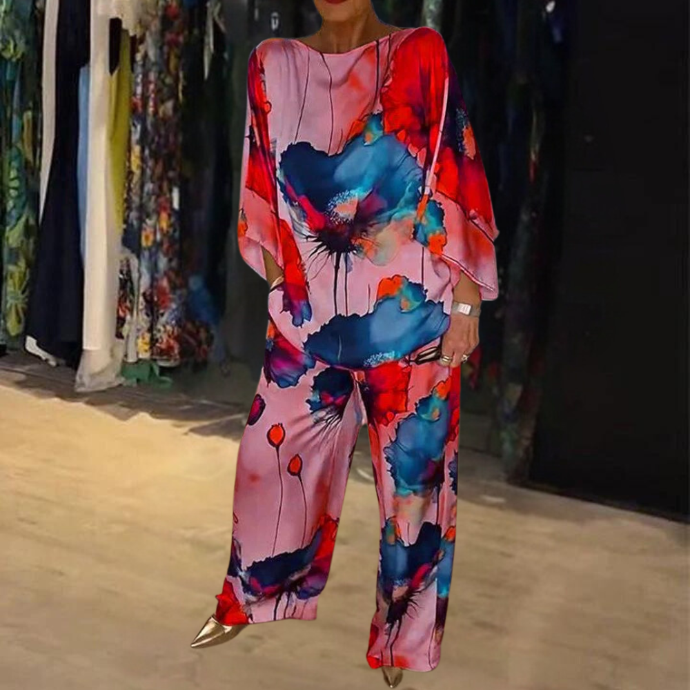 Espalda del conjunto de dos piezas para mujer, top sin mangas y pantalón holgado con estampado vibrante de verano.