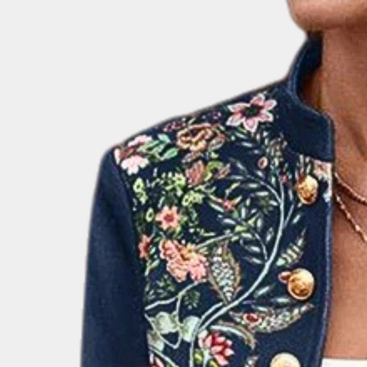 Chaqueta blazer floral de mujer con estampado vibrante. Prenda de vestir elegante para moda de oficina y atuendos casuales.