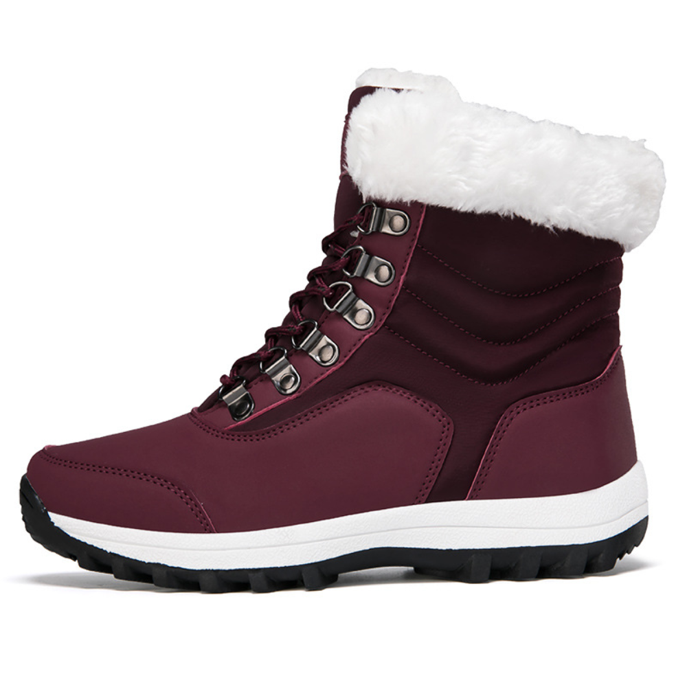 Botas LUCIA elegantes para mujer. Ideales para invierno, ofrecen calidez, comodidad y agarre antideslizante en la nieve.