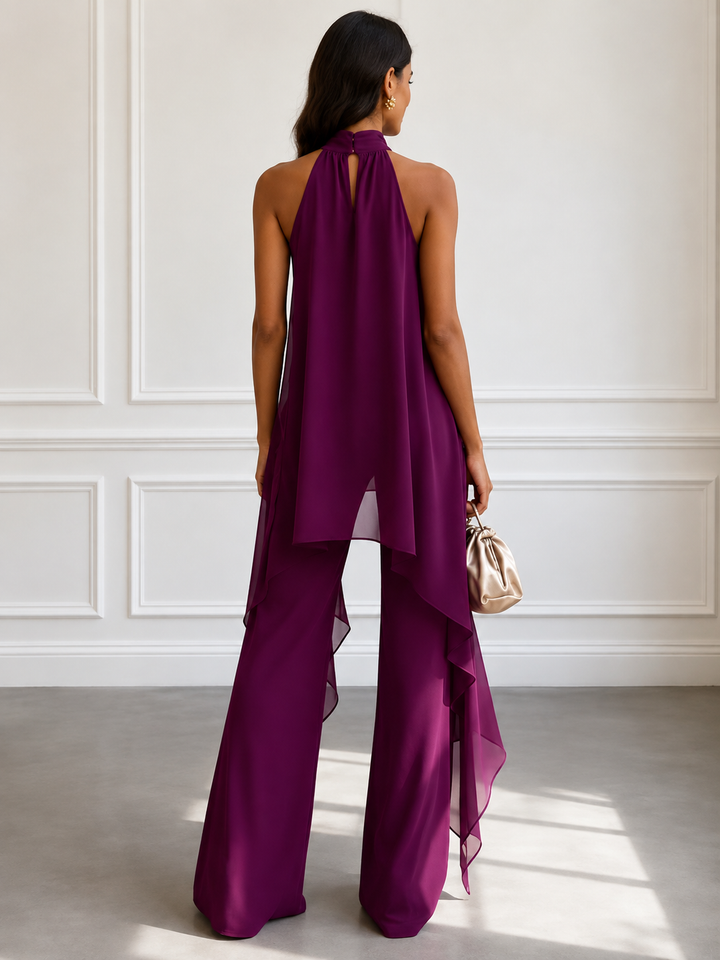 Elegante conjunto de fiesta morado para mujer, con top palabra de honor y pantalón palazzo versátil.