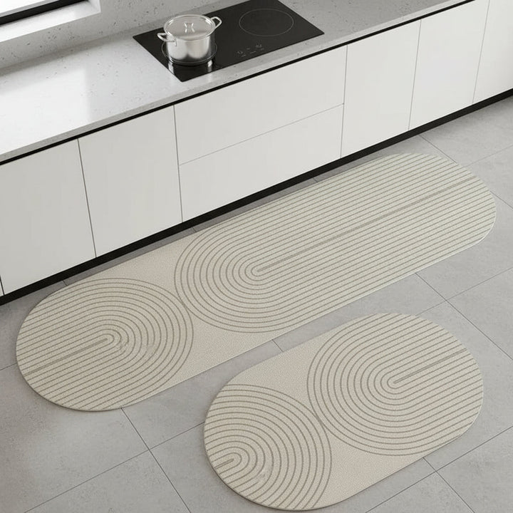 Cómoda alfombra de cocina antifatiga para largas horas. Superficie antideslizante y absorbente para tu hogar.