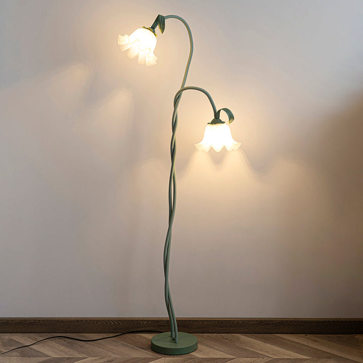 Lámpara de pie floral verde, un toque natural y moderno en tu decoración.