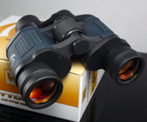 Binoculares 8x robustos para baja luz, ideales senderismo y observación nocturna, diseño unisex.