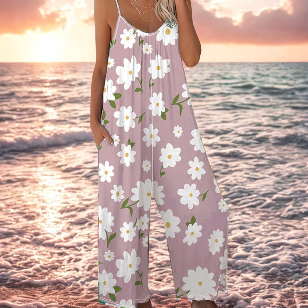 Mono de mujer casual con estampado floral, tirantes y pierna ancha, ideal para el verano y la playa.