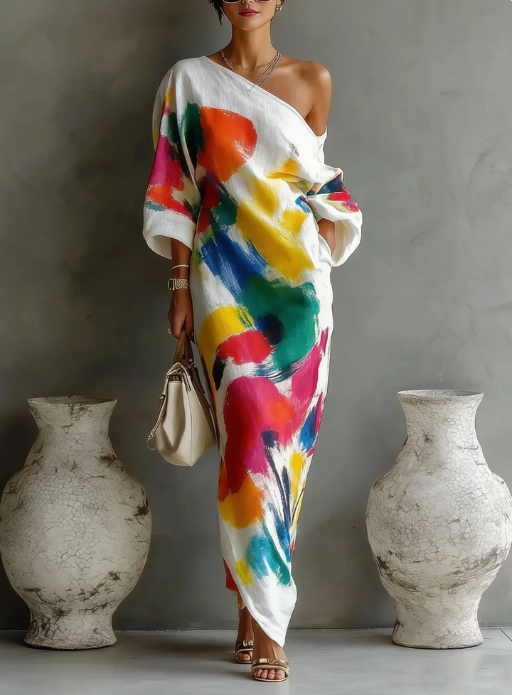 Vestido asimétrico maxi de mujer con estampado artístico colorido. Ideal para verano y fiesta.