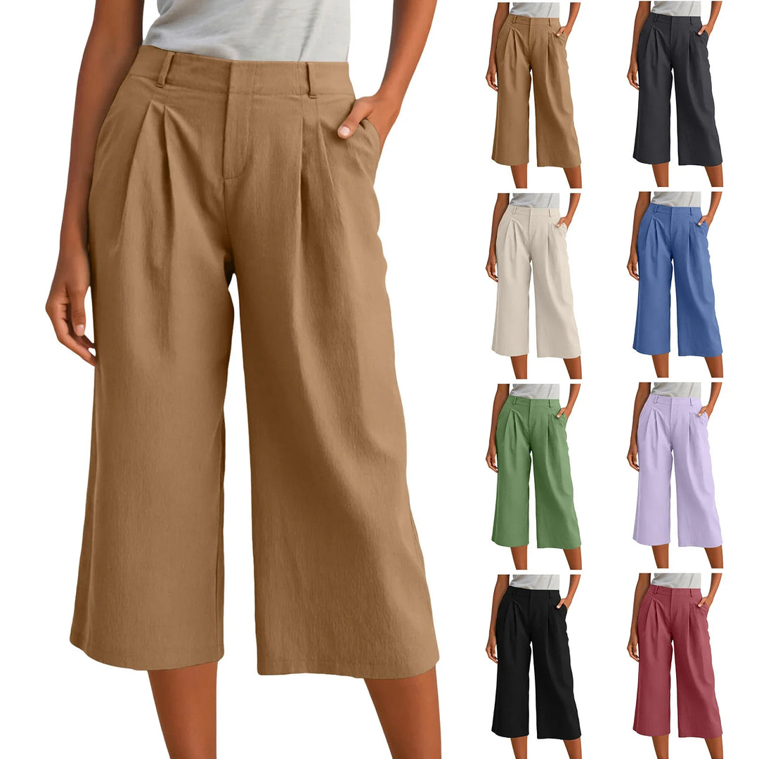 Modelo de pantalones mujer anchos y cropped con pinzas. Tiro relajado para un movimiento libre y estilo fresco.