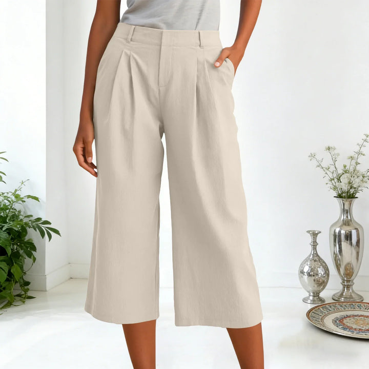 Pantalones mujer anchos cropped con pinzas. Diseño de tiro relajado para comodidad y estilo casual.