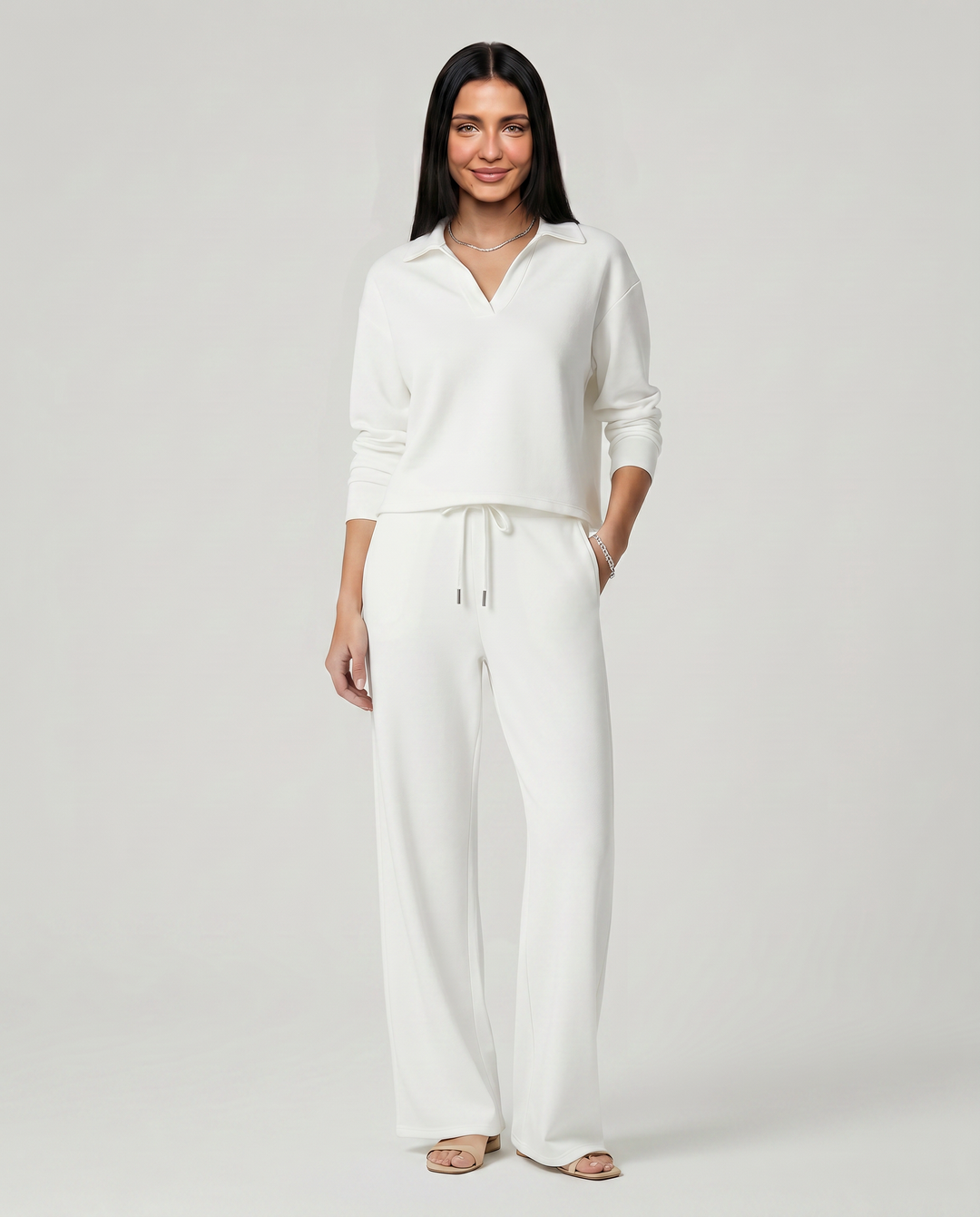 Conjunto de punto suave y cálido para mujer. Cuello V y pantalón ancho, mangas largas.