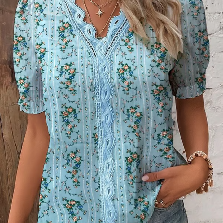 Manga larga de encaje con puño delicado. Detalle de blusa elegante y moderna para mujer.