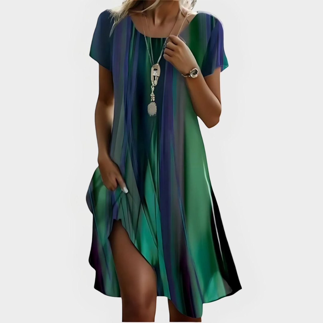Vestido fluido de verano para mujer, con escote pico y manga corta. Estilo casual bohemio y cómodo.
