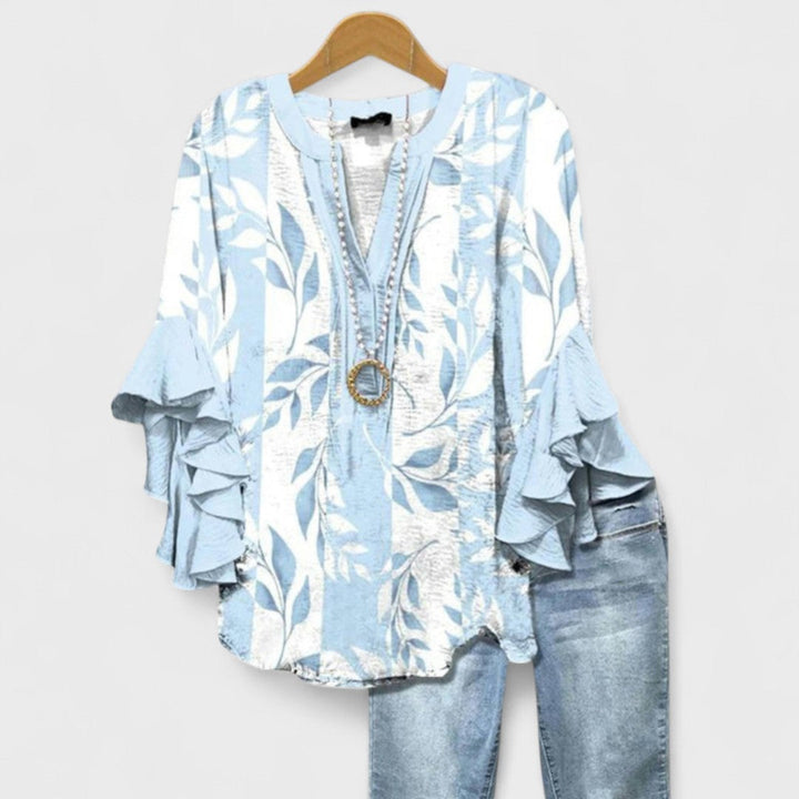 Top casual-elegante mujer, blusa Celia con volantes, estampado floral y manga larga.