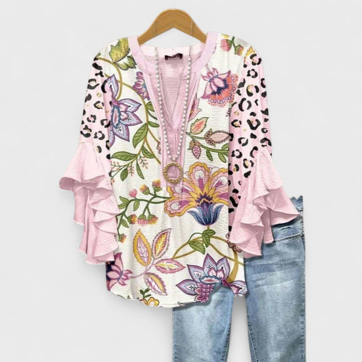 Blusa Celia de mujer para primavera/verano, volantes, estampado floral y manga larga.