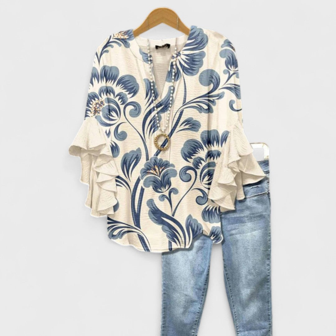 Blusa Celia de mujer con volantes, estampado floral y cuello V. Ideal primavera-verano.
