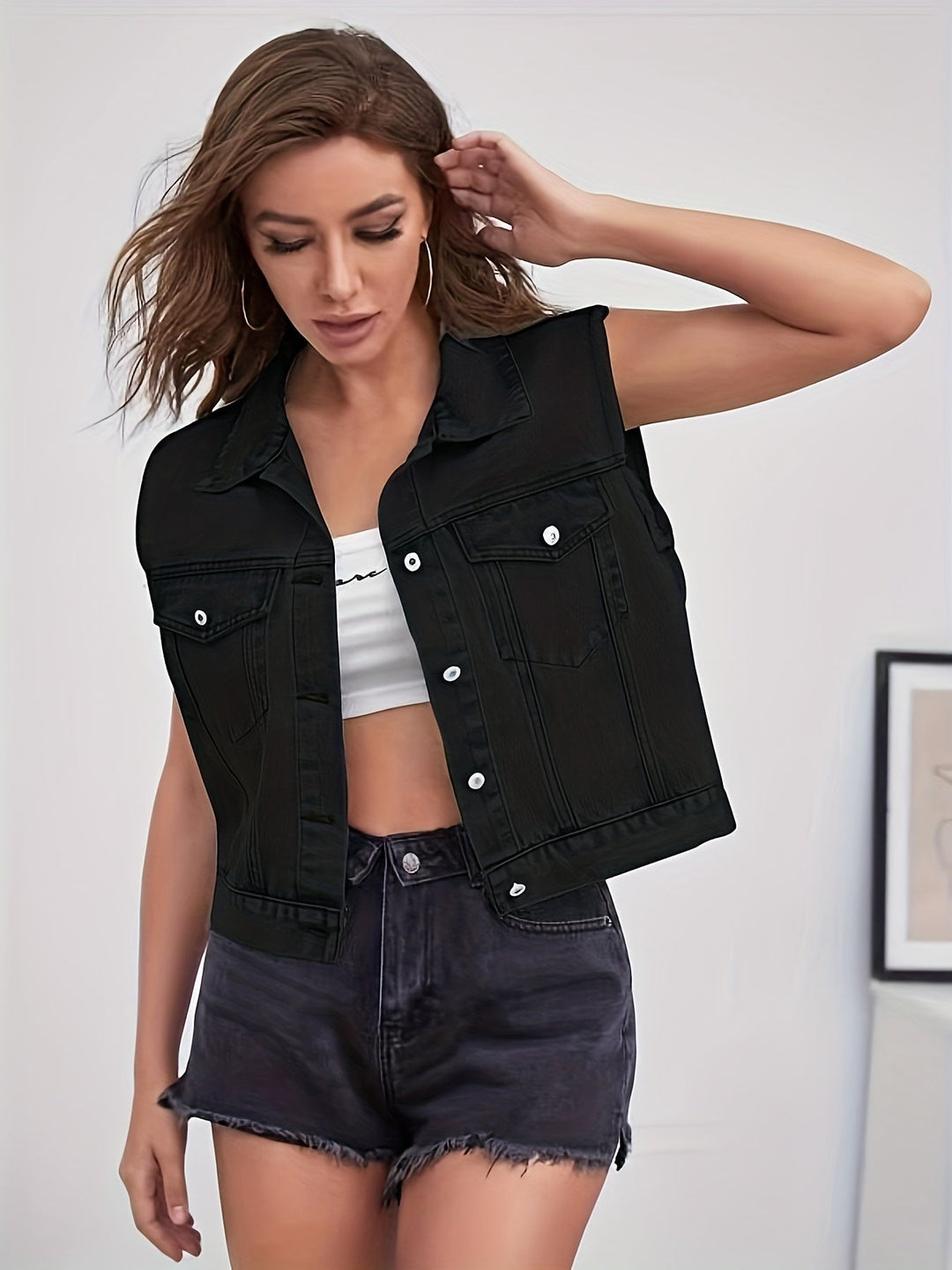 Chaleco de mezclilla lavado ácido para mujer, con un toque vintage. Estilo casual y versátil.