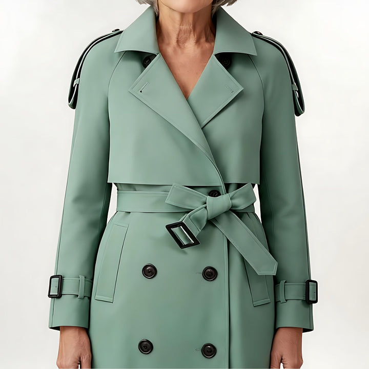 Abrigo gabardina de mujer con doble botonadura, cinturón y cuello solapa, ideal para un estilo elegante y funcional.
