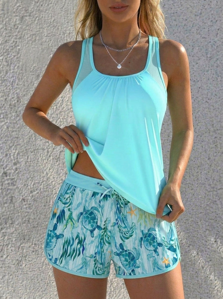 Tankini oceánico mujer con short de cobertura cómoda, ideal para playa y piscina. Estilo moda playa.