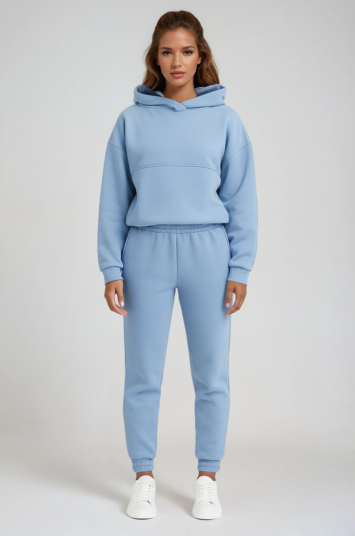 Conjunto deportivo de mujer cómodo: sudadera holgada y pantalón jogger, ideal para estilo casual otoño-invierno.