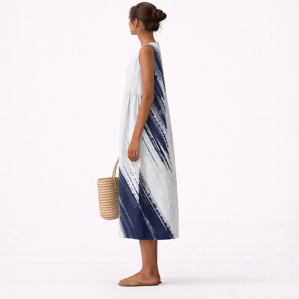 Vestido midi estampado abstracto para mujer. Diseño moderno sin mangas, perfecto para un look casual y fresco de verano.