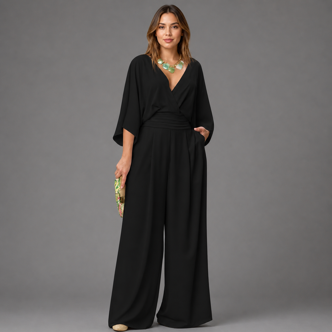 Mono elegante de mujer, ideal para fiesta y boda. Estilo sofisticado con escote V y pata ancha.