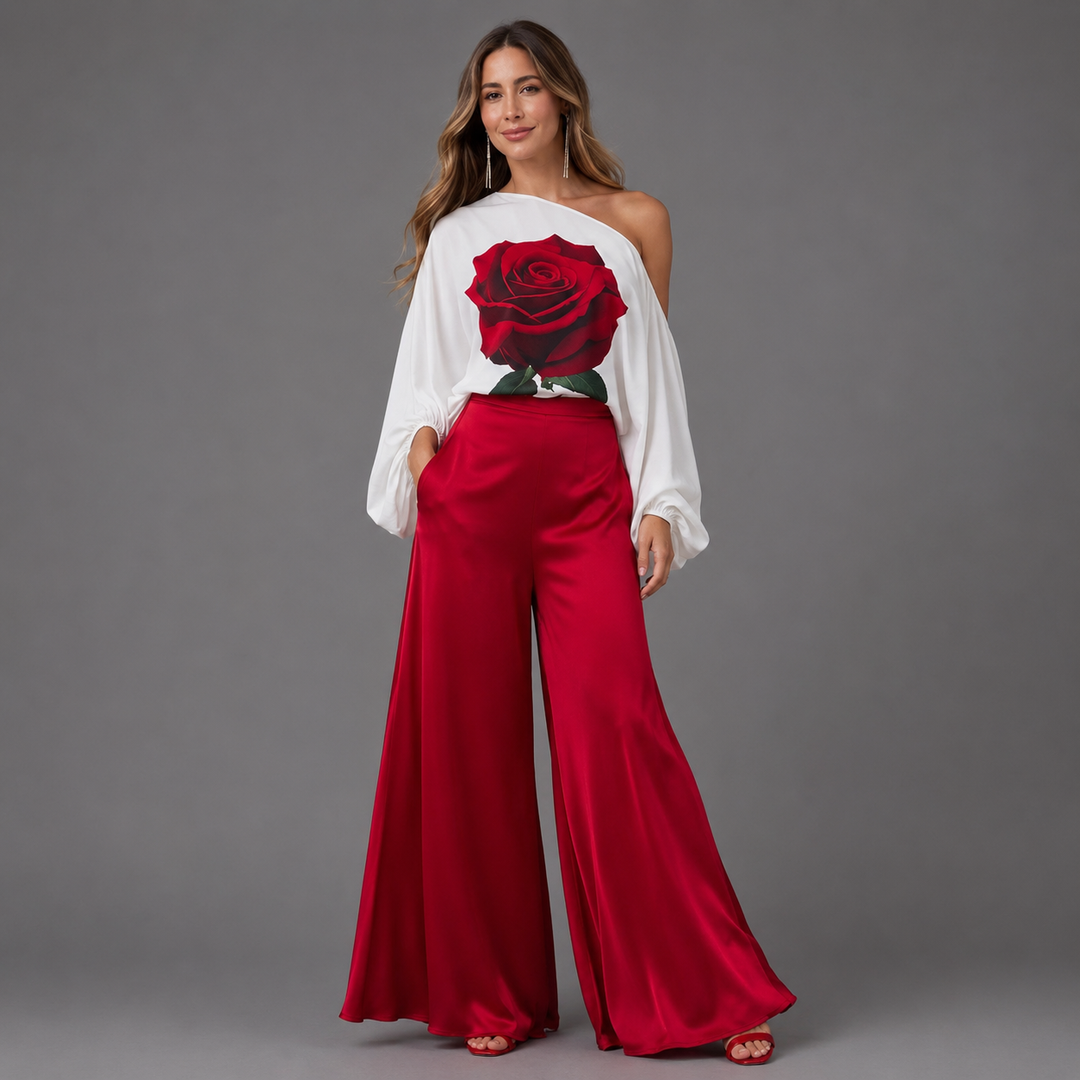 Conjunto elegante mujer multicolor con blusa de rosa estampado y pantalón ancho. Ideal para moda femenina otoño.