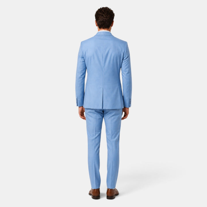 Estiloso traje de hombre para oficina y eventos, chaqueta y pantalón, corte sofisticado.