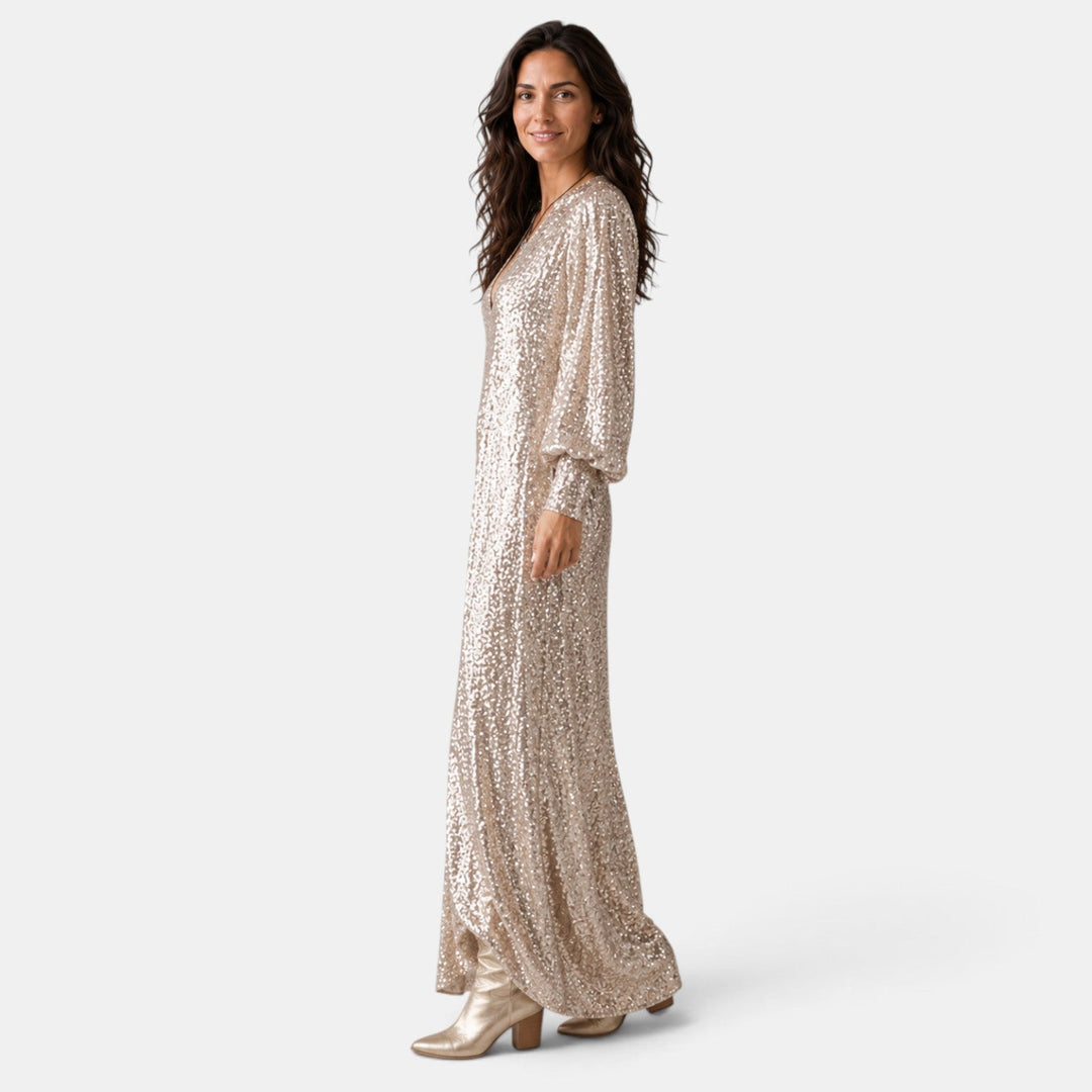 Maxi vestido fluido de lentejuelas para mujer. Ideal como vestido de invitada de boda o gala.