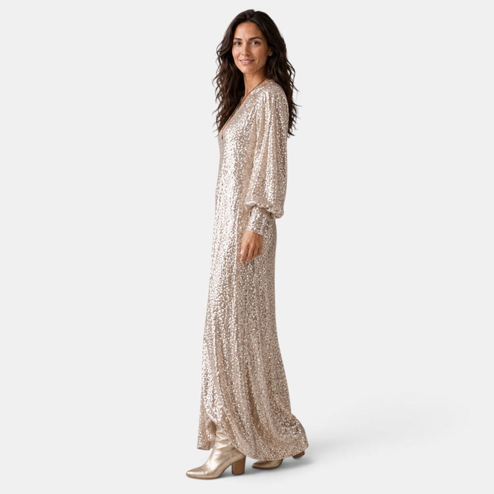 Maxi vestido fluido de lentejuelas para mujer. Ideal como vestido de invitada de boda o gala.