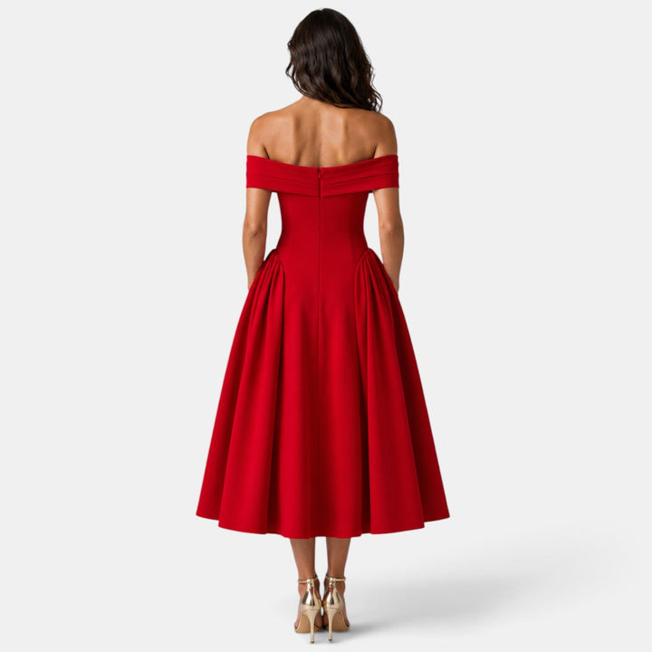 Vestido de fiesta midi para mujer, con escote off-shoulder y falda evasé. Moda femenina elegante.