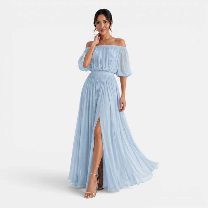 Elegante vestido largo de mujer en chifón plisado, perfecto para bodas y eventos de moda.