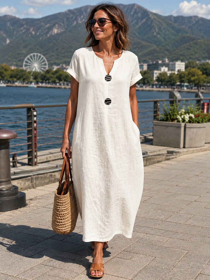 Vestido largo de mujer efecto lino con botones, ideal para un estilo casual de verano.