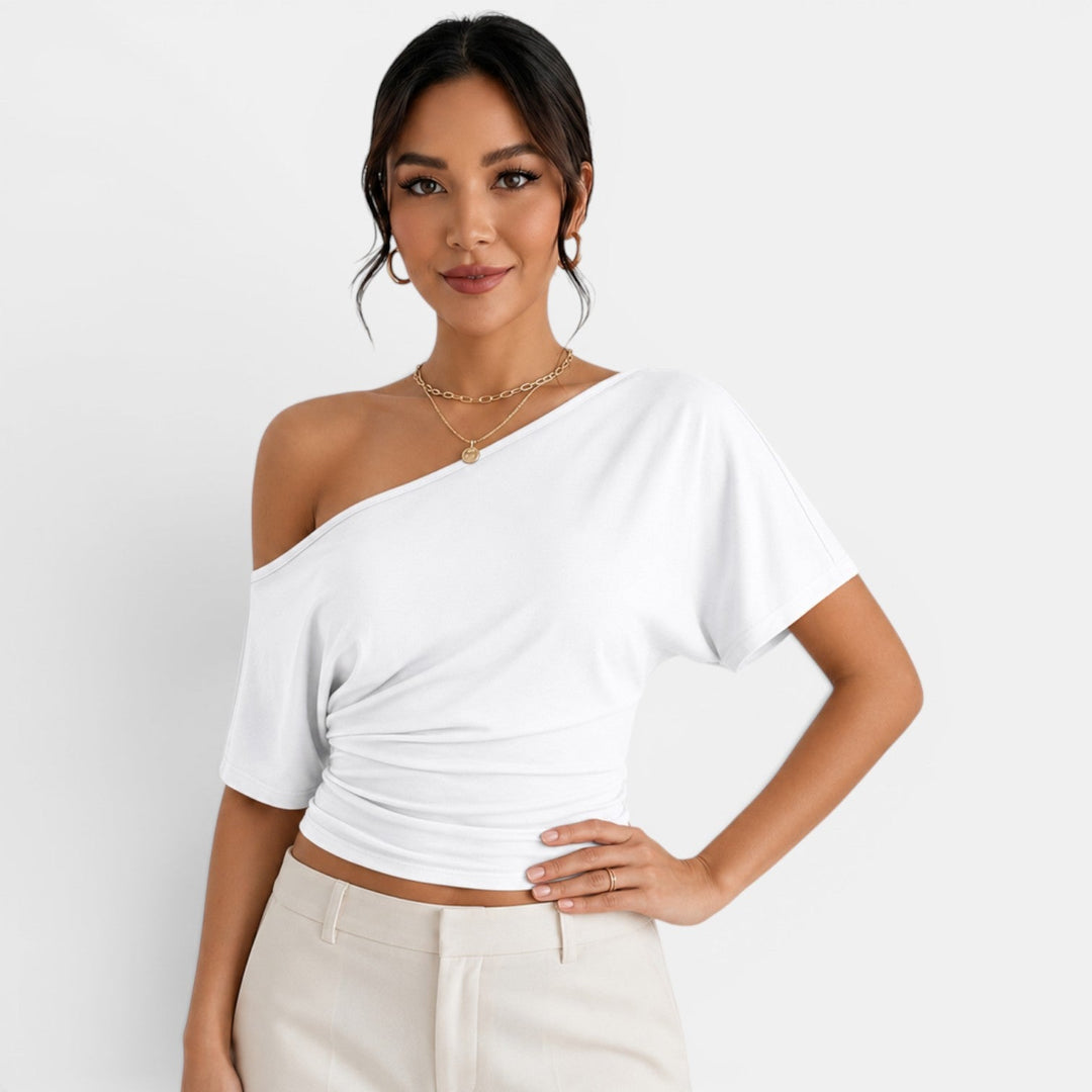 Top de mujer con hombros descubiertos. Blusa elegante y fresca de manga corta, ideal para verano.