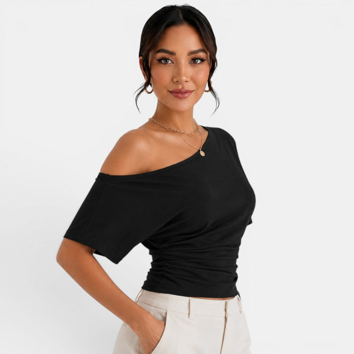 Versátil top de mujer con hombros descubiertos. Prenda elegante y cómoda para un look fresco veraniego.