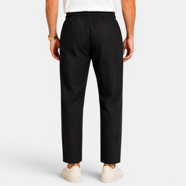 Textura del pantalón de lino para hombre, tejido transpirable ideal para el calor.
