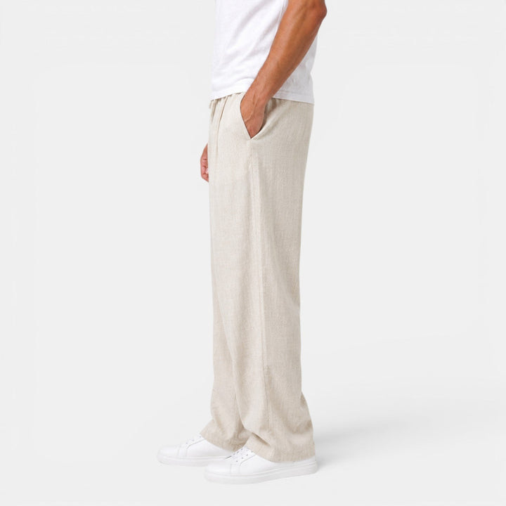 Pantalón de lino transpirable para hombre, perfecto para playa, vacaciones o un look casual de verano.