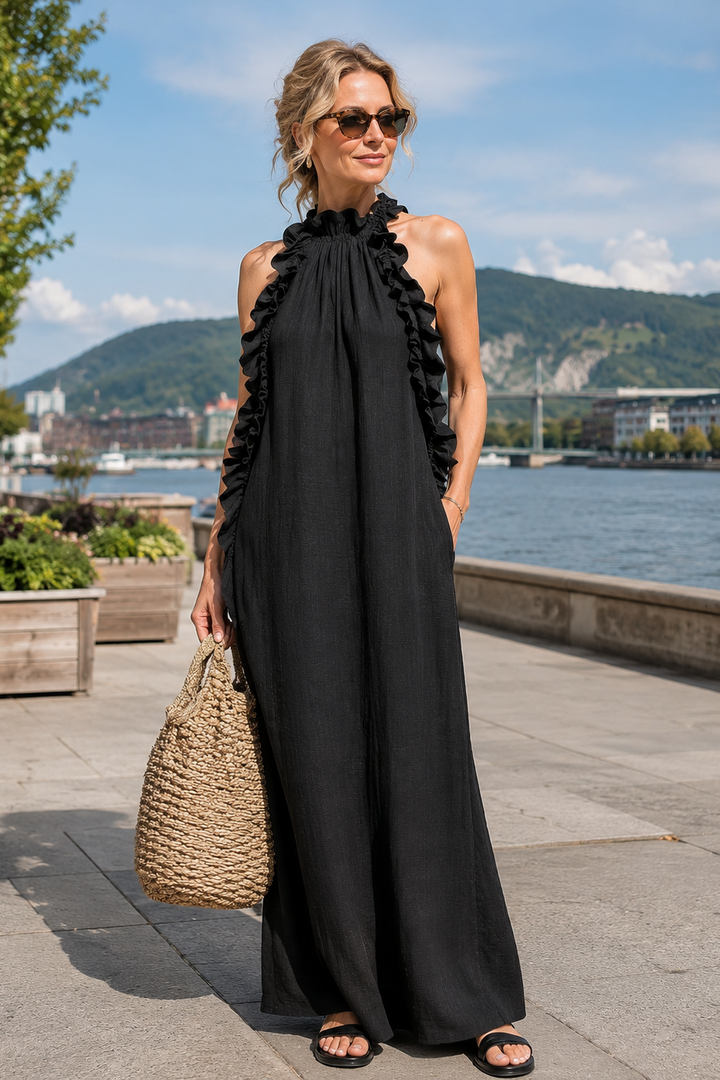 Vestido maxi de mujer con volantes sin mangas y bolsillos laterales, ideal para un look casual.